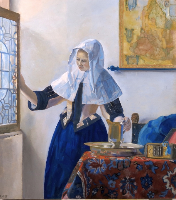 Young woman with a water pitcher